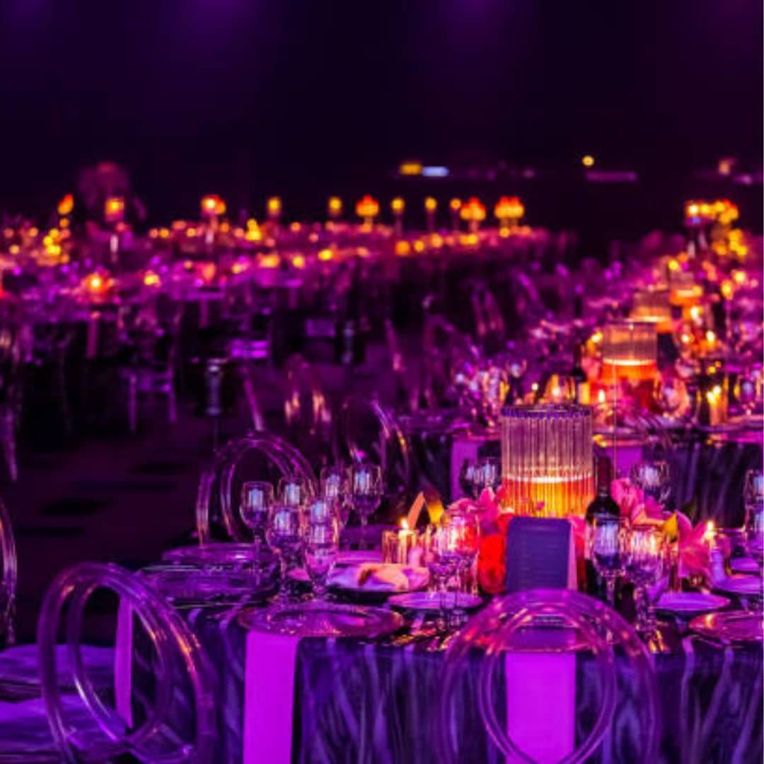 Gala dinner tables lit in purple in Singapore